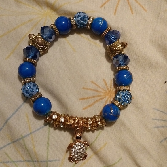 Blue and gold beaded bracelet - Picture 1 of 6